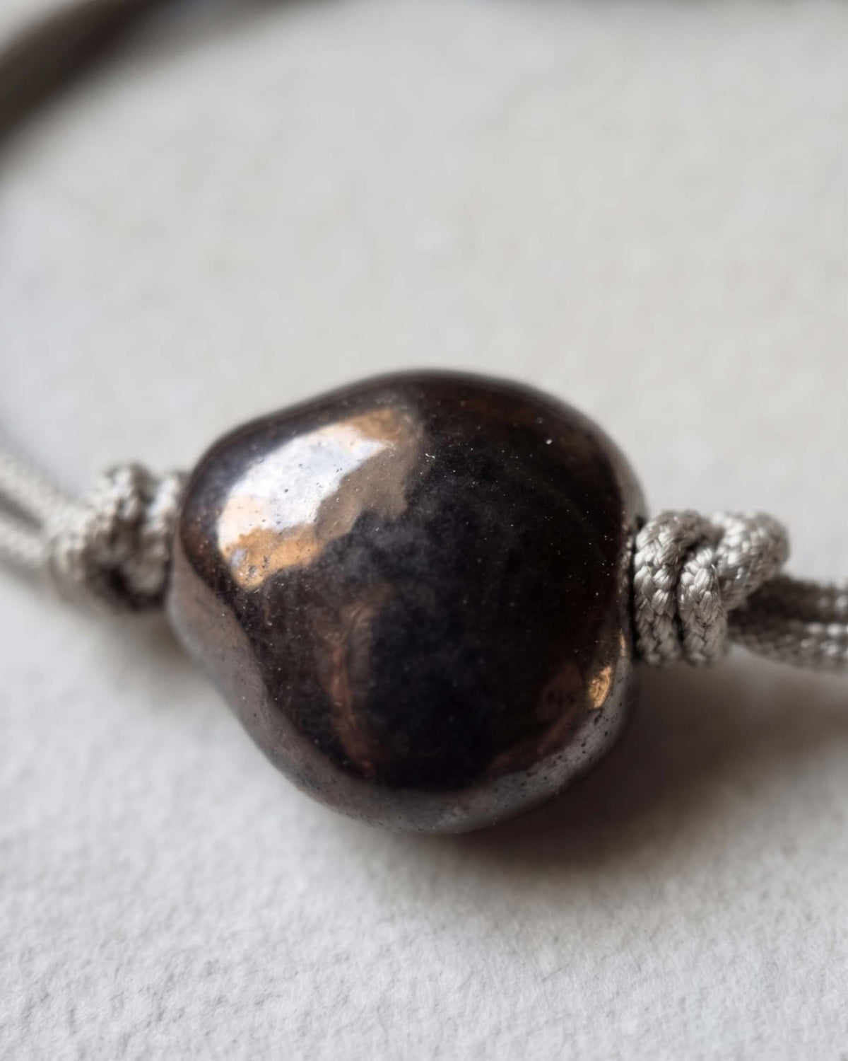 Bracciale Sacro Om – macro della perla