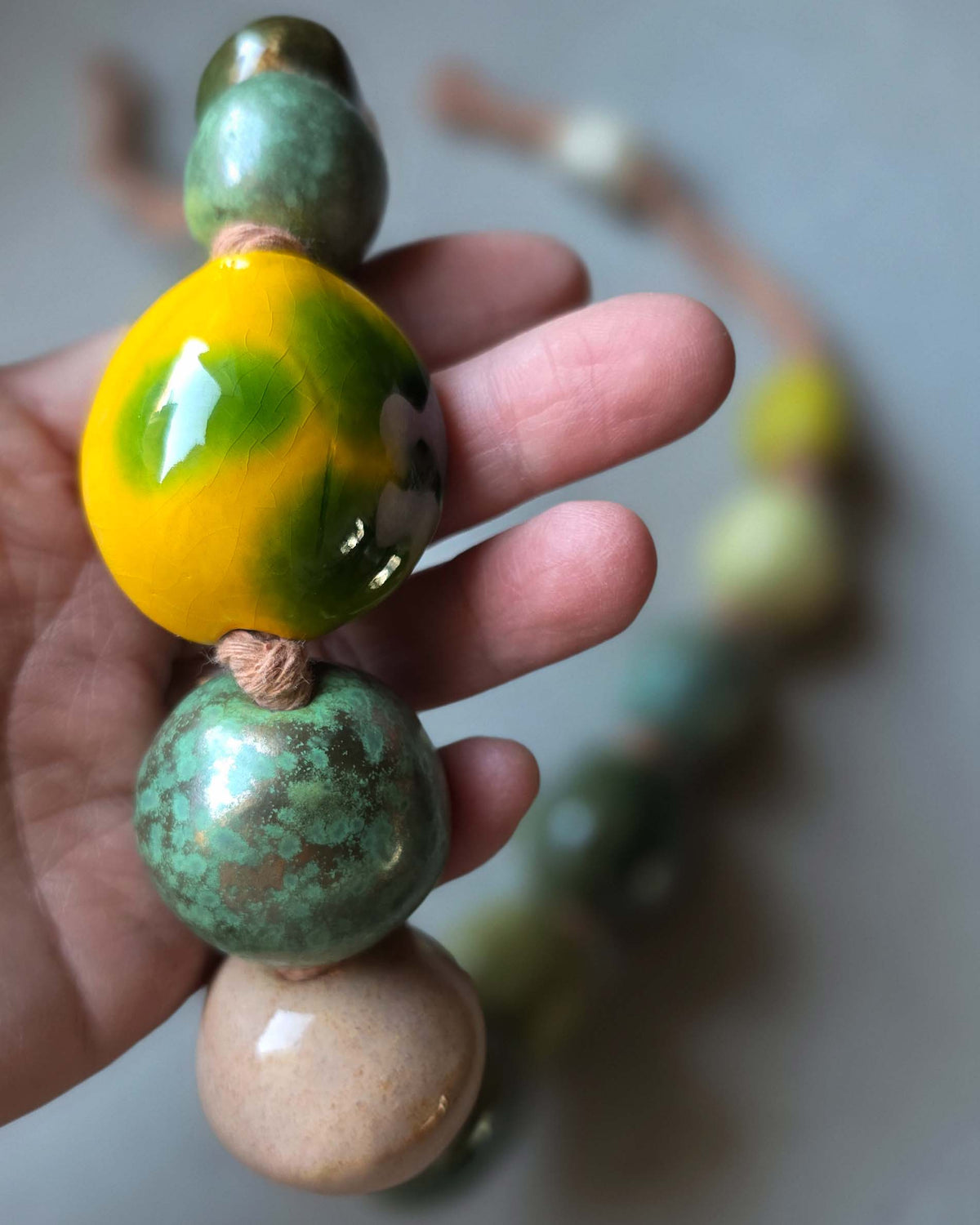 grandi perle in ceramica smaltata